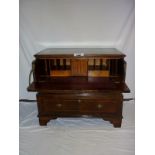 A Georgian walnut secretaire chest with