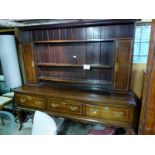 A superb early/mid 18c oak dresser with