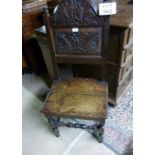 An 18c country chair with detailed carve