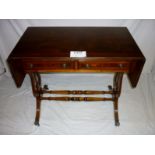 A 20c mahogany sofa table with lyre end