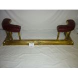 An early 20c brass fire fender seat with