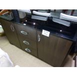 A Designer sideboard with black glass to
