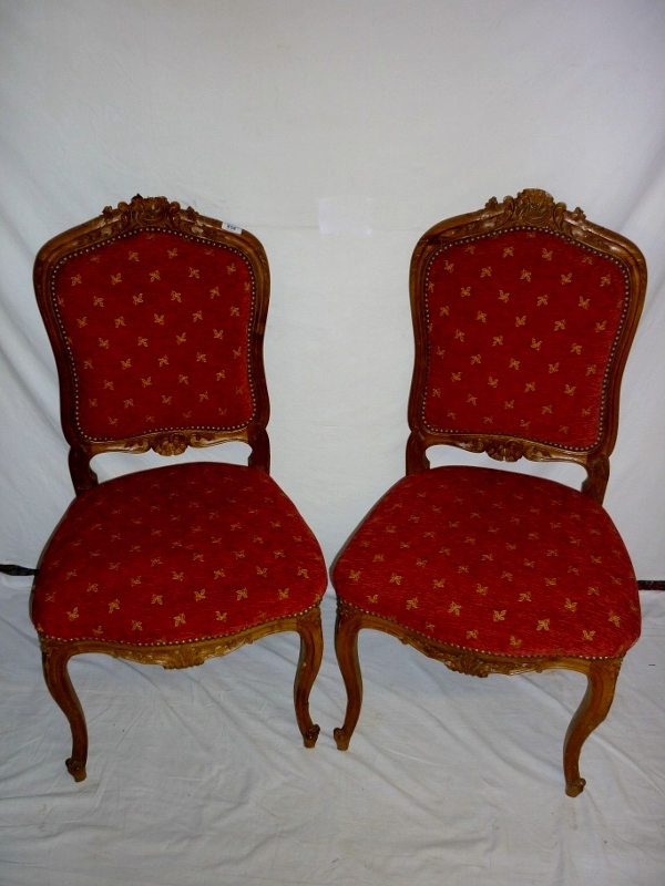 A pair of French style walnut chairs uph