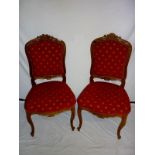 A pair of French style walnut chairs uph