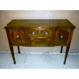 A 20c mahogany serpentine sideboard of g