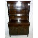 A 20c oak dresser of small proportions a