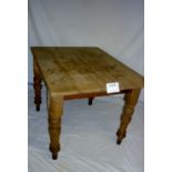 A 20c pine kitchen table with turned leg