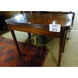 A George III mahogany turn over tea tabl