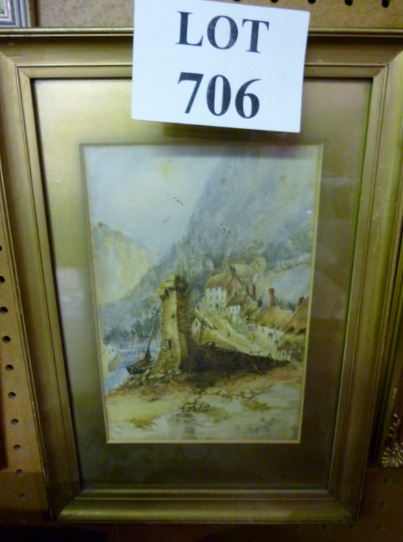 A framed and glazed study of a seaside v