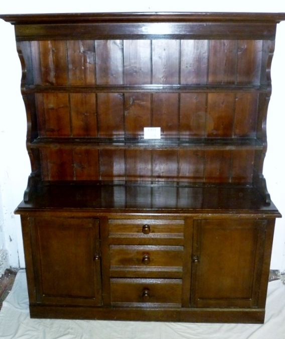 A 19c oak and pine dresser with a panell