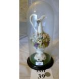 A 19c glass dome with a porcelain ewer d