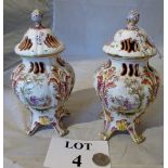 A pair of late 19c early 20c lidded vase