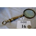 A brass magnifying glass est: £20-£40 (N