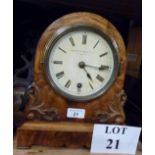 A Victorian walnut cased mantel clock by