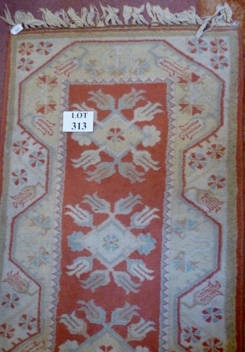 A 20c cream ground runner with pink and