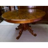 A Victorian design walnut pedestal table