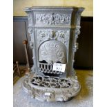 A highly decorative French iron fire est