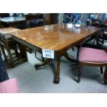 A 19c mahogany oblong dining table on a
