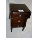 An early 20c mahogany chest of three dra