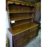 A 20c old charm style oak dresser with p