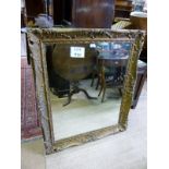 A 19c gilt carved wall mirror (slightly