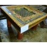 An eastern painted low table with metal