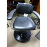 A mid 20c metal and black swivel chair w