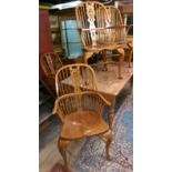 A set of six yew wood Windsor armchairs