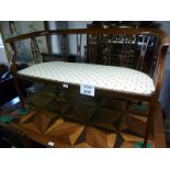 A pretty Edwardian mahogany inlaid two seater sofa est: £100-£150