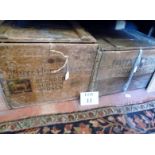 Two old wooden boxes advertising Whiskey