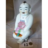 A Chinese porcelain Buddha est: £30-£50