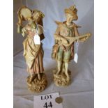 A large pair of Royal Dux figurines modelled as a pair of Tyrolean musicians he with a mandolin