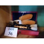 A cased set of ivory and bristle brushes and three other brushes est: £25-£45 (B12)