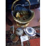 A brass coal scuttle and copper pans, a plated teapot, pewter,