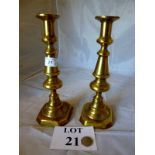 A pair of early 19th century brass candlesticks est: £30-£50 (A2)