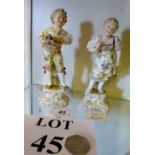 A pair of Continental figurines modelled as a youth and companion in 18th century dress,