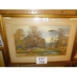 A framed and glazed watercolour depicting figures working in a woodland clearing signed C Earle