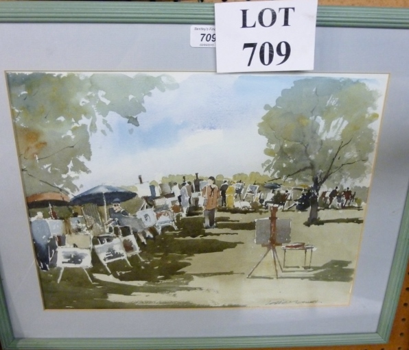 A framed and glazed watercolour study of a group of artists painting outside signed Leslie Marsh