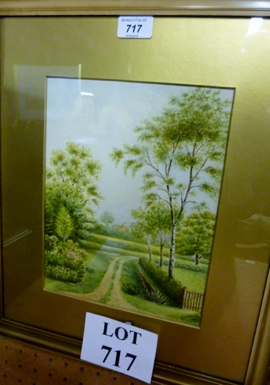 A framed and glazed watercolour depicting a garden scene signed R J Williams and dated 1924 lower