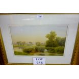 A framed and glazed watercolour depicting a country landscape scene with swans on a pond est: