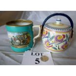 A late 19th century Pratt ware pottery mug and a Poole Pottery biscuit barrel c.