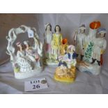 Four Staffordshire flat back figural groups or spill vases (some a/f) est: £40-£60 (A1)
