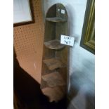 A rustic pine corner wall shelf with six graduated shelves est: £20-£30