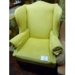 An early 20c winged armchair upholstered in pale suede good condition est: £200-£400