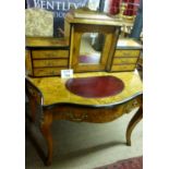 A fine Victorian walnut inlaid bonheur de jour with raised drawers over a leather top and drawer