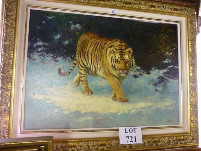 A framed 20c oil on board study of a tiger signed Joel King lower right est: £40-£60
