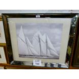 A contemporary framed and glazed photograph depicting sailing yachts at sea in a decorative