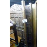 An Indian hardwood fret work four fold screen 6' high approx est: £100-£150