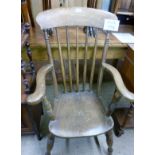 A 19c elm seated Windsor armchair slightly a/f est: £40-£60