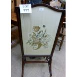 An Edwardian mahogany framed fire screen with lift up silk panel est: £40-£60